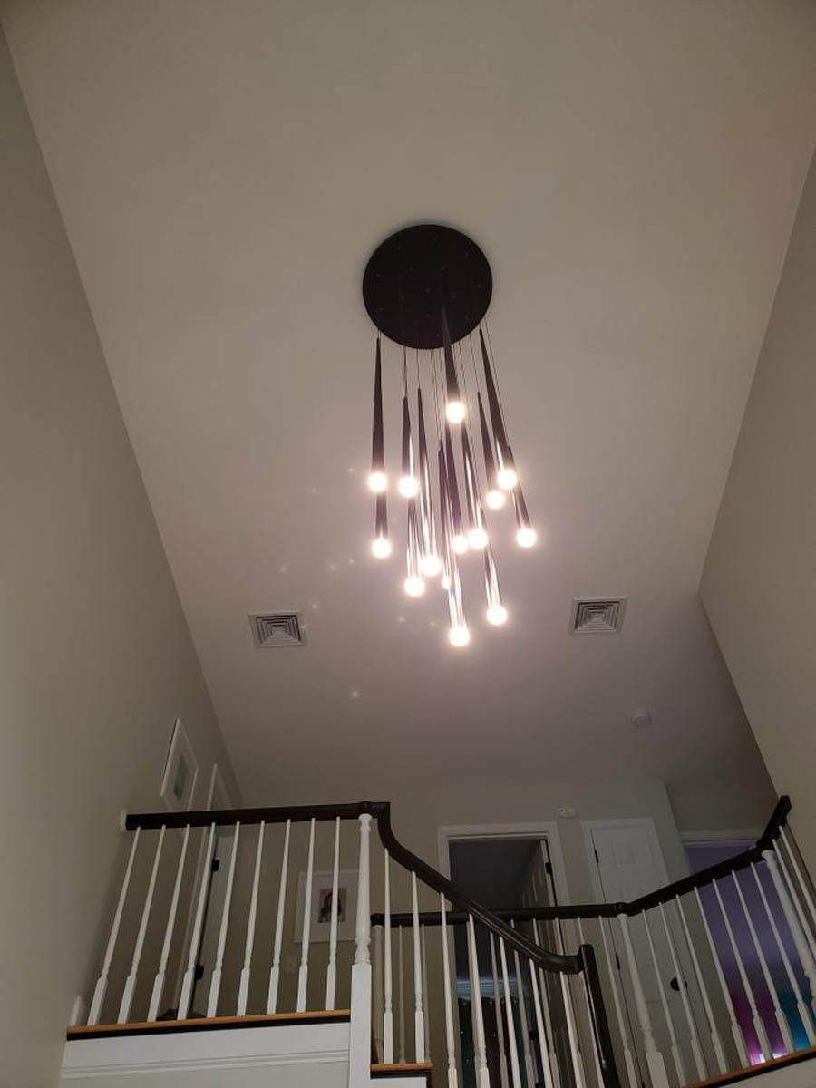 high ceiling with decorative lighting